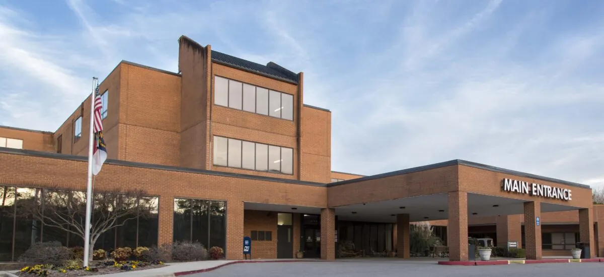 central carolina hospital. a brick building with pavement