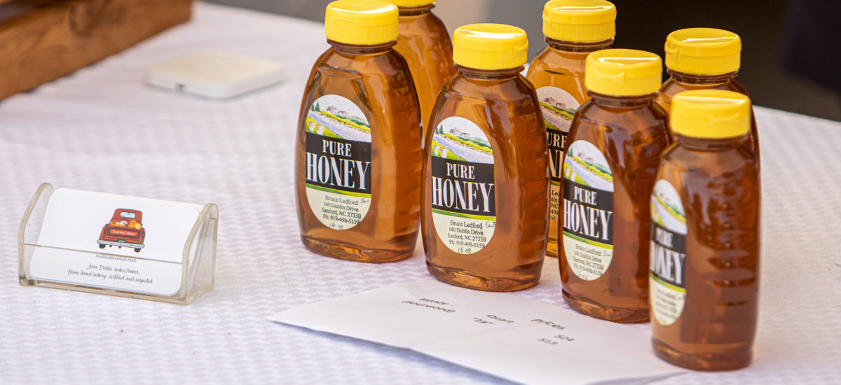 7 jars of locally sorced honey. Credit: Ahmod Goins
